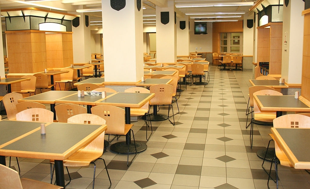 A modern cafeteria waits for people to arrive